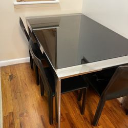 Glass Dinning Table With  Leather Chairs 