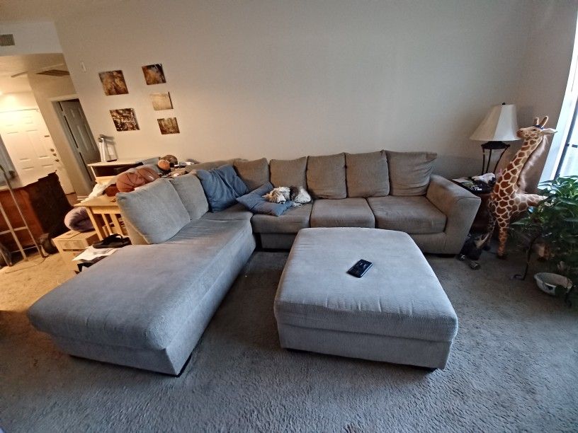 Sectional    Grey.                $75.00.          Tonight