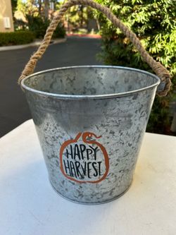 Metal Party pail with rope handle.