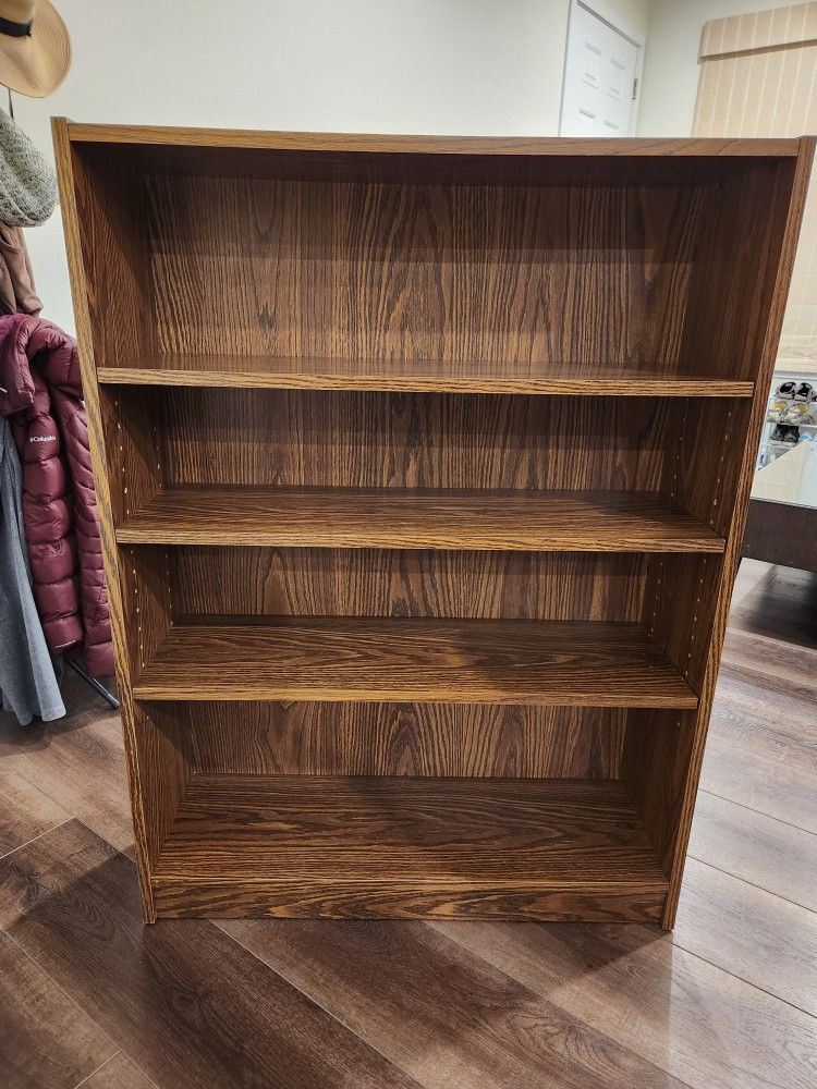 Sterdy dark wood bookcase/ bookshelf  with four adjustable shelves. 48x36x12 inch, good condtion 