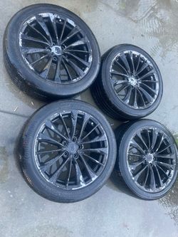 G37  coupes stock wheels 19s with meaty tires $350