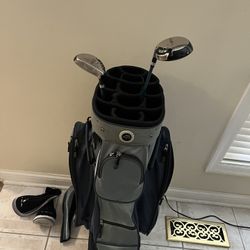 Golf Bag And 2 Clubs 