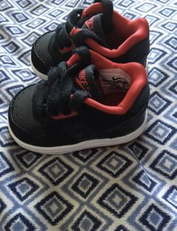 Black & Red Nike size 2c