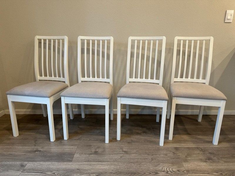 4 White Wooden Chairs With attached padding