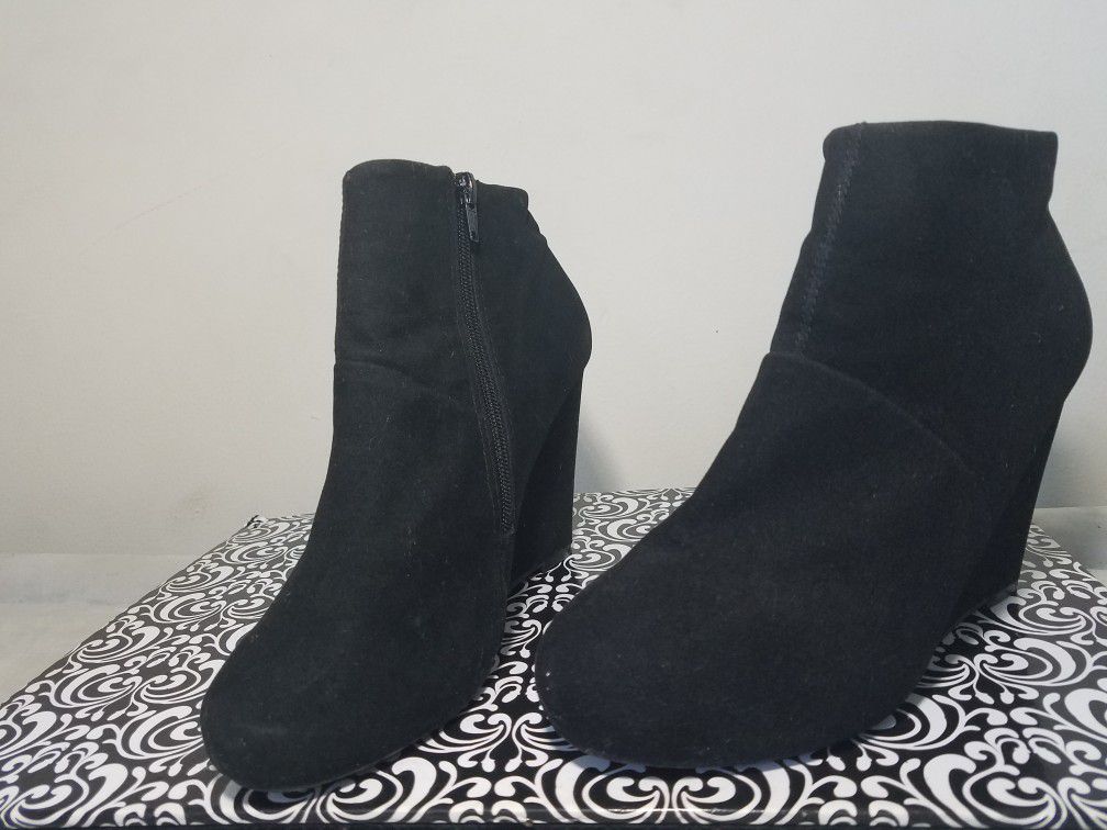 Black pair of booties