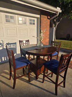 Counter Height Dining Table with Bottom Storage + 4 Newly Reupholstered Bar Stools + Leaf Extension