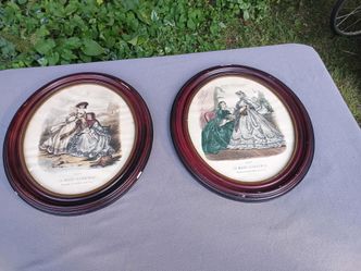 2 Antique French fashion lithograph from the 19th century, presented in a dark wood oval frame