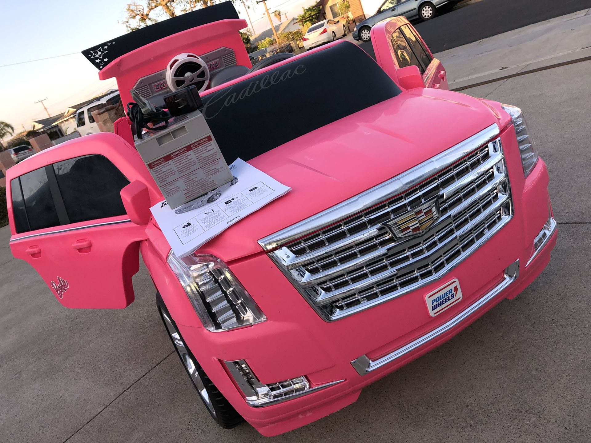 Power wheels 2024 pink cadillac
