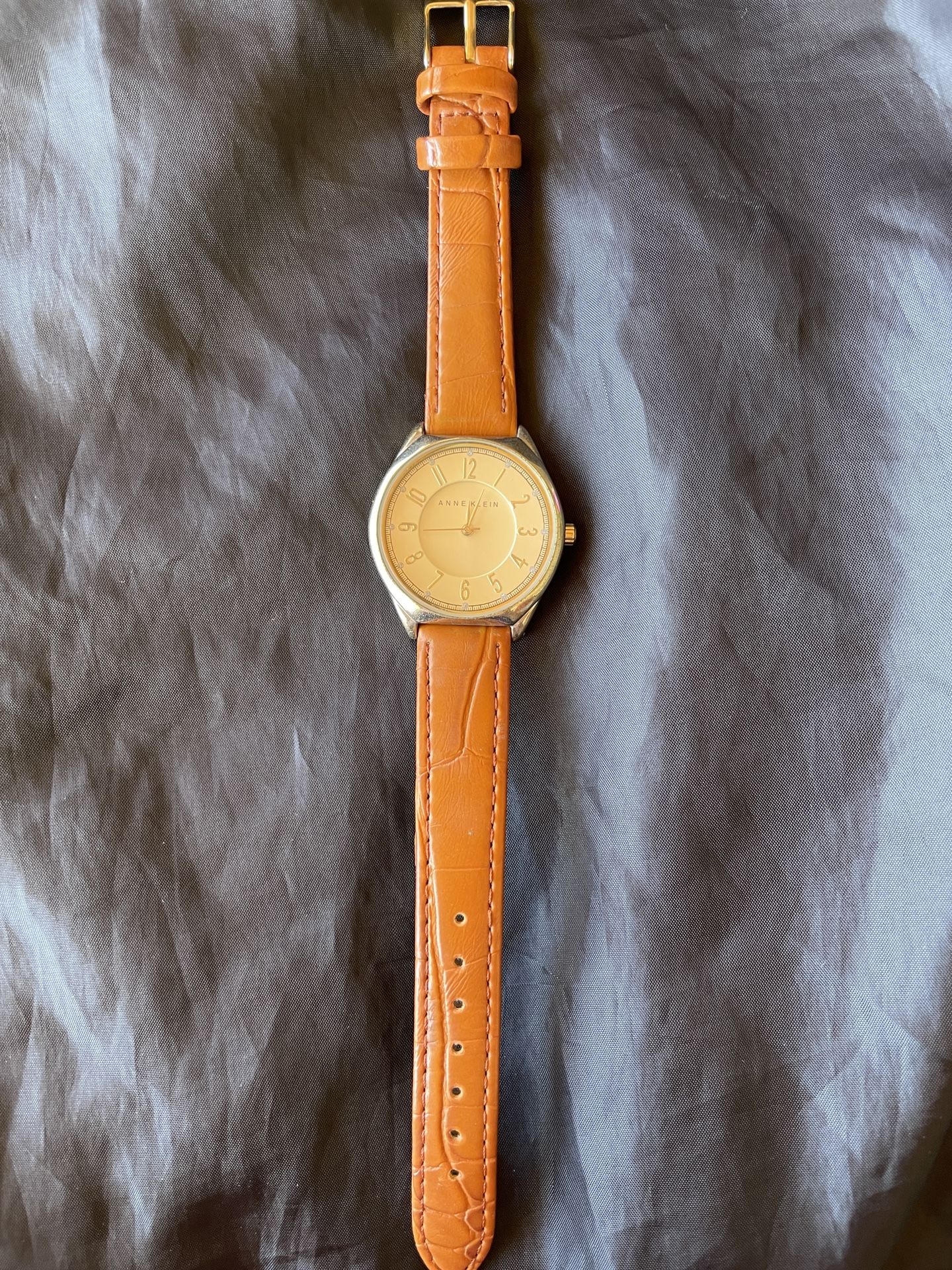 Anne Klein AK/2322 Round Gold Dial Silver Tone Bezel Leather Band Watch