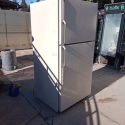 Refrigerator GE In Good Condition Deliver And 30 Day Warranty Price $280 obo