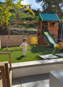 Backyard swing set with slide