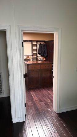 Master Bedroom Closet custom designed Cabinets including Center Island
