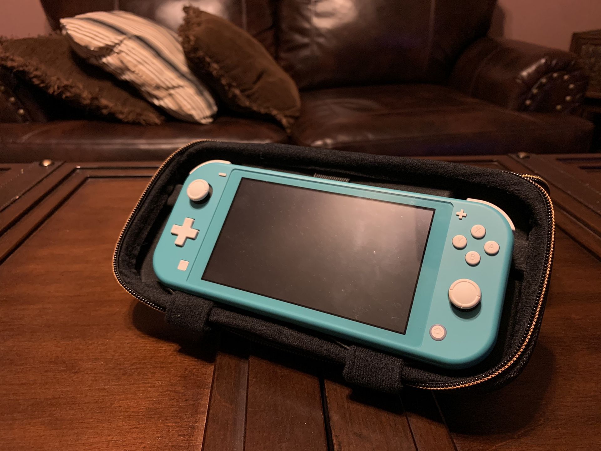 Teal Nintendo switch w/animal crossing game
