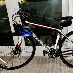 $3000. Excellent shape. Barely used. Cannondale bicycle. Carbon frame. Medium size. Twenty-two inches (56 cm). 