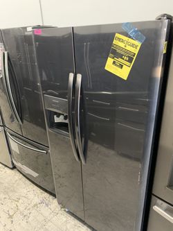 Frigidaire side by side in dark stainless