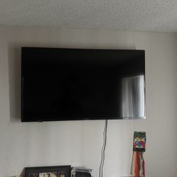 Tv, Dresser, And Double Bed