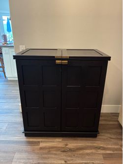Beautiful Crate and Barrel 2-door flip top bar and wine/liquor cabinet