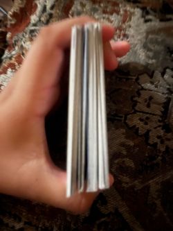 100 cards with baseball and a few of Pokémon