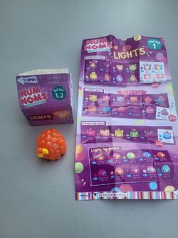 Num Nom's orange glittery plastic berry collectible figure/toy in box with Checklist