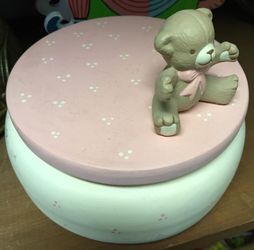 Vintage music box with teddy bear