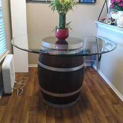 Barrel table with glass top
