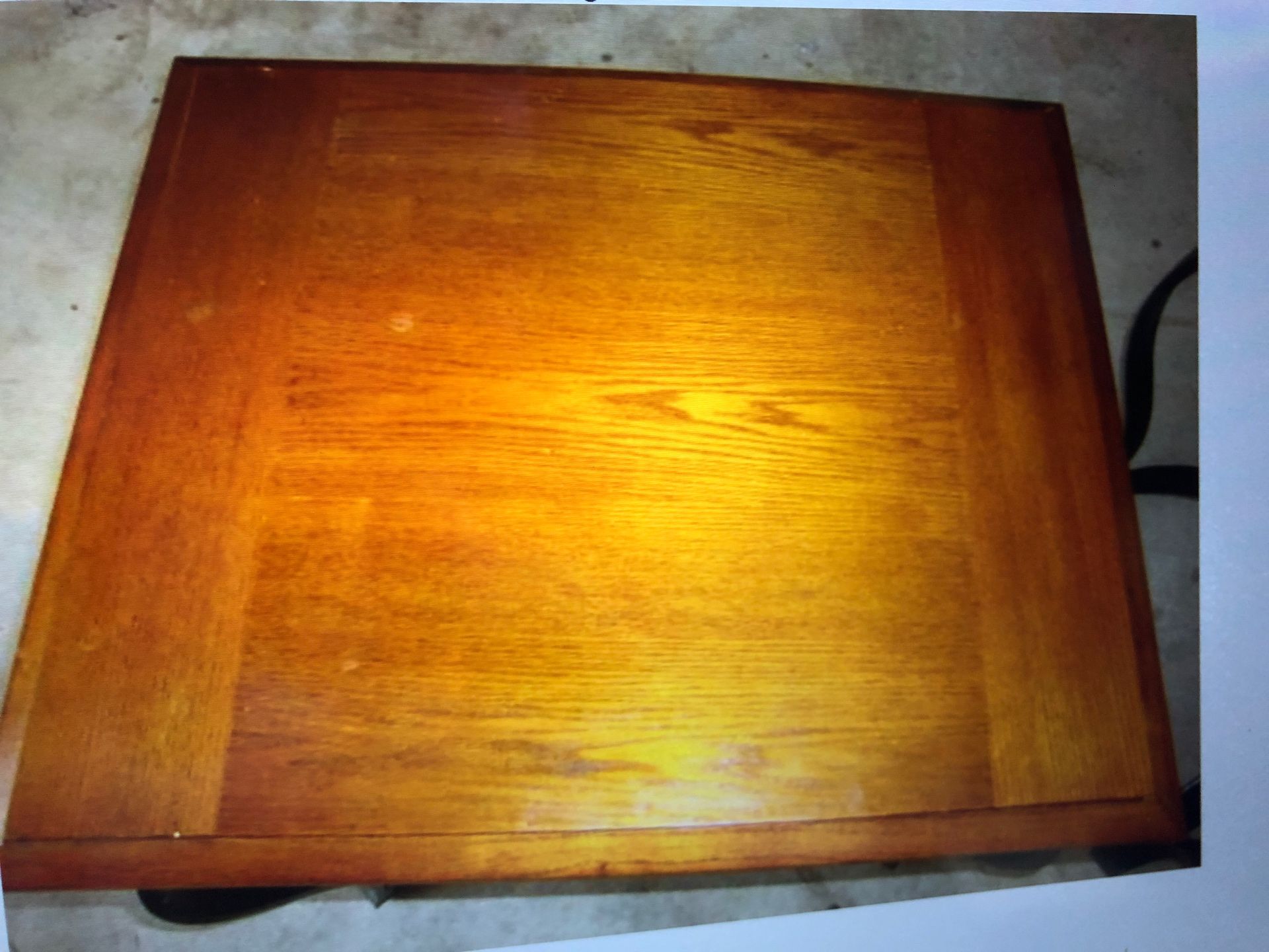 Two wrought iron legs and wood top end tables