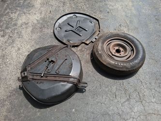 C3 1980 CORVETTE ORIGINAL  SPARE TIRE & CARRIER TUB  w/ HARDWARE