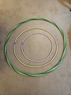 HULA   HOOPS.  CELEBRATE SPRING!  GREAT FUN AND WAIST TRIMMER IN ONE!  THREE AVAILABLE  ($5 Each)