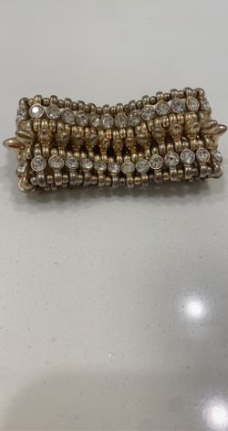 Gold bracelet with stones