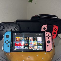 Nintendo Switch OLED W/ Pro Controller Extra Joycons And Games