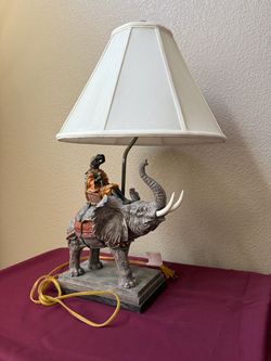 Decorative Table Lamp Featuring an Elephant with a Rider and a White Fabric Shade
