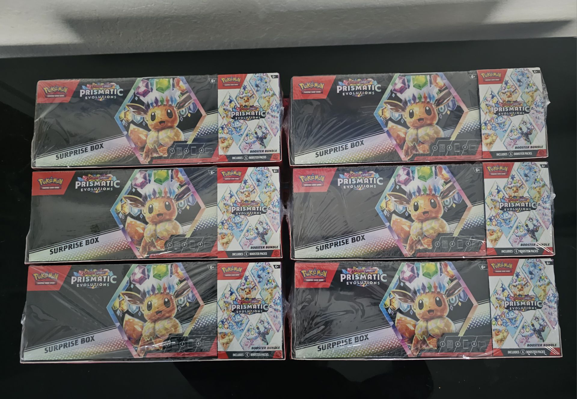 Pokemon Prismatic Evolutions Booster Bundle & Surprise Box