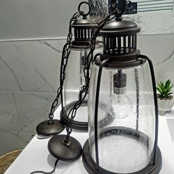 Pendant lights with seeded glass approximately 19" tall , in Very Nice Conditions for indoor or outdoor use , Set Of 3  $90