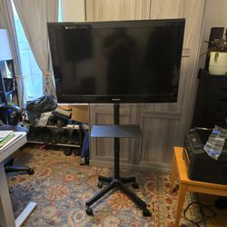 Samsung 40"  TV with stand and Universal remote. 
