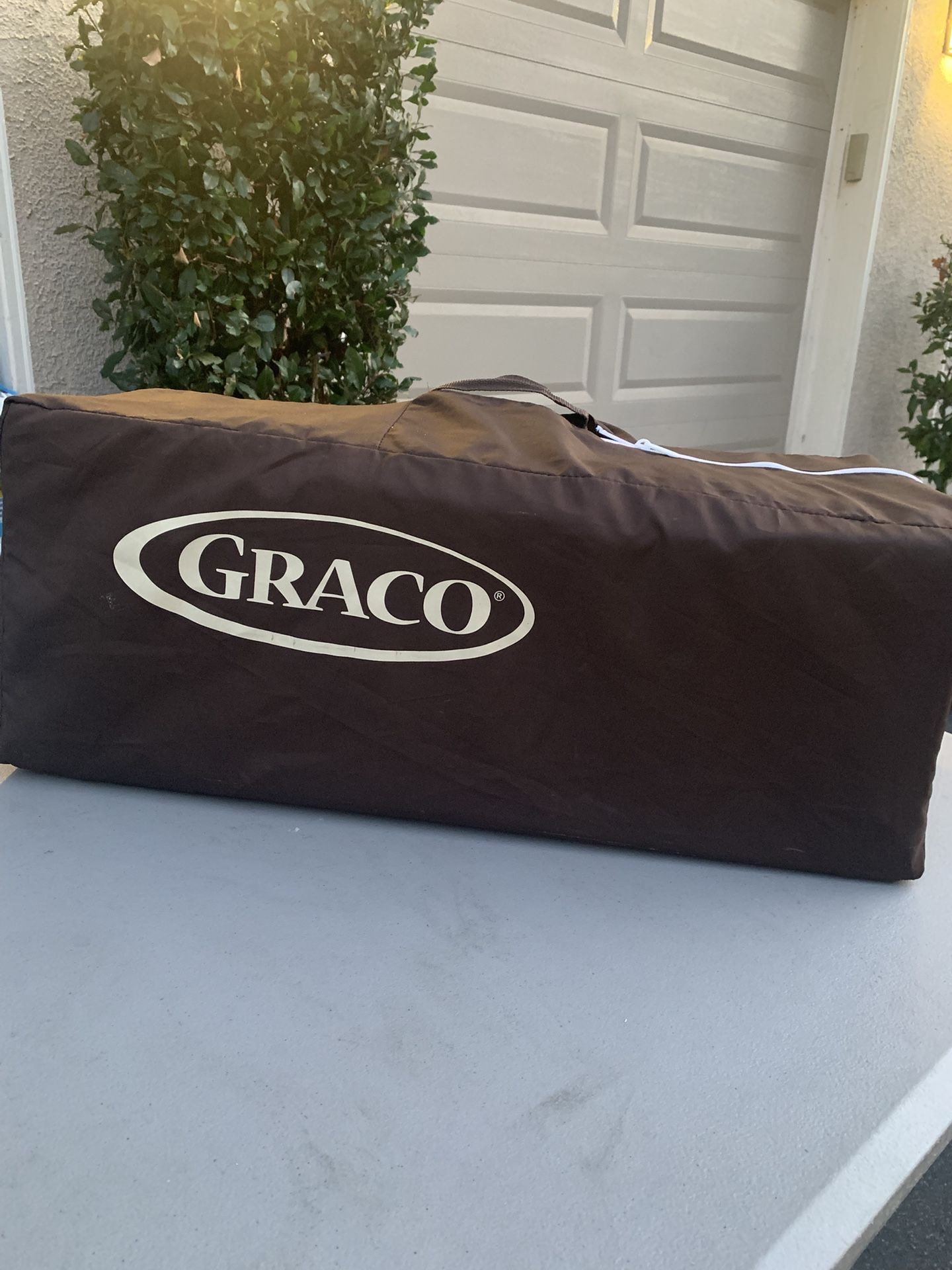 Graco Pack n Play (brown)
