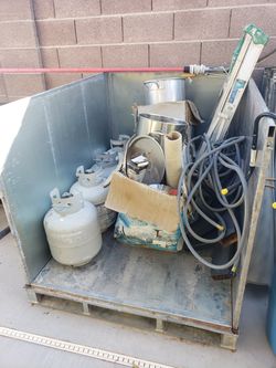 Metal collapsible bins on pallet