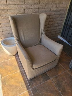 2 brown couches