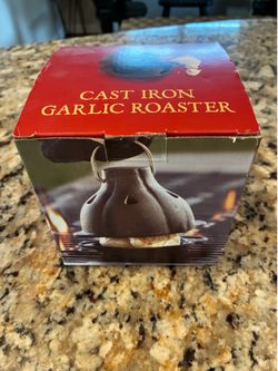 Cast iron garlic smasher