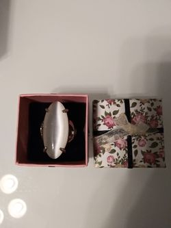 Ring with white synthetic stone. Brand new!!
