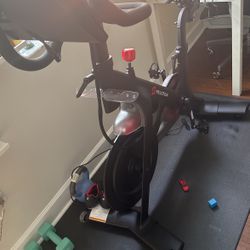 Peloton Bike With Mat And Two Pairs Of Bike Shoes 