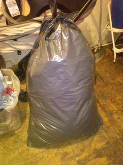 Big trash bag full of good winter clothes $50 a bag