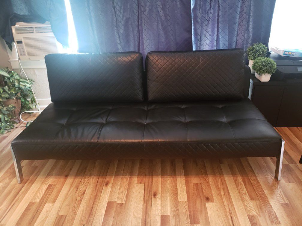 Leather tufted futon PRICED TO SELL!