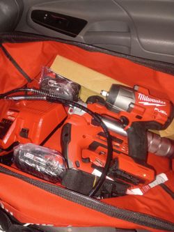 Milwauke impact wrench and grease gun combo kit brand new