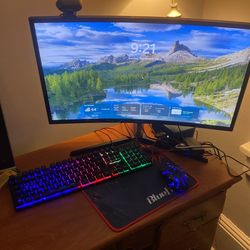 Setup Curved Monitor+ Mouse + Keyboard +Bluetooth+wire Headset/And Or  Live Stream Camera  Depending On Your Budget Or What Your Looking To Do 
