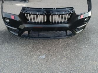 2016-2019 bmw X1 front bumper with All the accessories.
