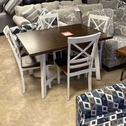 Brand new dinette with four chairs for 499