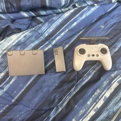 DJI Avata 2 battery (with charging hub) and FPV Controller 2 