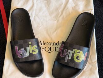 Louis Vuitton Mule slides.