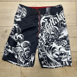 Billabong board shorts feature a graphic print of skulls