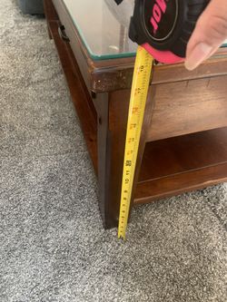 Brown center table and end table with glass top